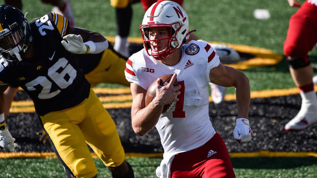Luke McCaffrey running with the ball